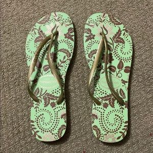 Havainanas green and gold flip flops